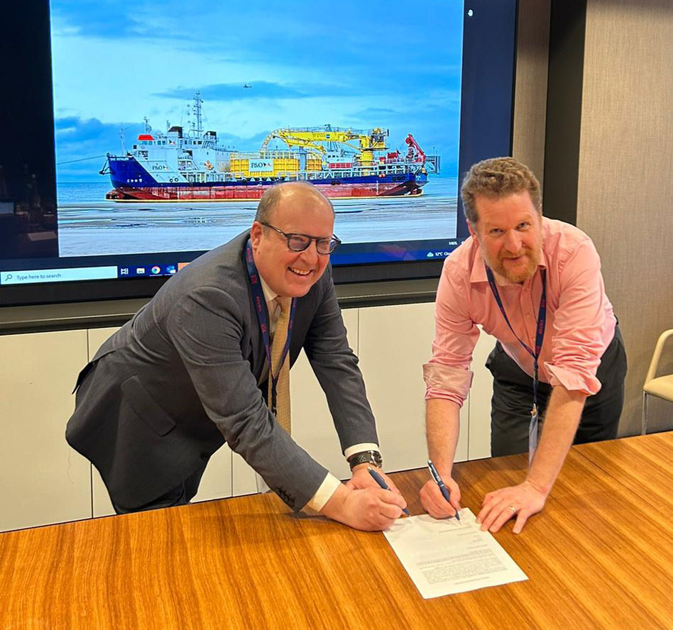 Enshore Subsea's Pierre Boyde, and Herbosch-Kiere's Benny De Sutter, sign the Topaz Installer contract.